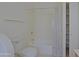 Bathroom with toilet, tub/shower, and shelves at 38065 N Cave Creek Rd # 2, Cave Creek, AZ 85331