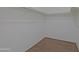 Walk-in closet with hardwood floors and white walls at 38065 N Cave Creek Rd # 2, Cave Creek, AZ 85331