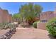 Exterior courtyard view showcasing landscaping and architecture at 38065 N Cave Creek Rd # 2, Cave Creek, AZ 85331