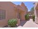 Exterior view featuring a covered front patio, desert landscaping, and a view of the community at 38065 N Cave Creek Rd # 2, Cave Creek, AZ 85331