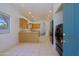 Open kitchen area featuring tile floors and modern appliances at 38065 N Cave Creek Rd # 2, Cave Creek, AZ 85331