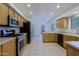 Bright kitchen featuring stainless steel appliances and tile flooring at 38065 N Cave Creek Rd # 2, Cave Creek, AZ 85331