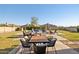 Well-manicured backyard with a built-in barbecue area and ample seating, creating an ideal setting for outdoor gatherings at 3917 E Patrick Ln, Phoenix, AZ 85050