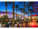 Desert Ridge Marketplace featuring palm trees, seating areas, and an AMC movie theater for shopping and relaxing at 3917 E Patrick Ln, Phoenix, AZ 85050