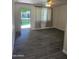 Inviting living room featuring tile floors and an open doorway to the outside at 4224 N 12Th St # 108, Phoenix, AZ 85014