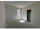 A bedroom with 1 window and a closet is shown at 46868 W Old Timer Rd, Maricopa, AZ 85139