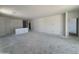 Expansive living room presents a blank canvas ready to be made into the space of your dreams at 46868 W Old Timer Rd, Maricopa, AZ 85139