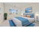 Stylized bedroom features large window, serene artwork, and plush carpet at 4933 W Capistrano Ave, Laveen, AZ 85339