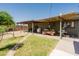 Inviting covered patio with an open backyard and exterior view of the home at 5637 N 63Rd Dr, Glendale, AZ 85301