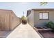 Wide side yard with concrete driveway and block fence at 5637 N 63Rd Dr, Glendale, AZ 85301