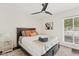 Cozy bedroom featuring ceiling fan, warm colors, and a comfortable bed at 5912 E Wethersfield Rd, Scottsdale, AZ 85254