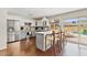 Bright and spacious kitchen with stainless steel appliances and open floor plan at 5912 E Wethersfield Rd, Scottsdale, AZ 85254