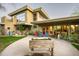 Exterior view of a multi-level home with a patio and desert-friendly landscaping at 6306 N Camelback Manor Dr, Paradise Valley, AZ 85253