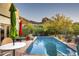 Backyard pool oasis with mountain views, comfortable seating, and ample patio space at 6306 N Camelback Manor Dr, Paradise Valley, AZ 85253