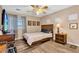 Cozy bedroom features a ceiling fan and natural light at 6376 W Louise Dr, Glendale, AZ 85310