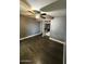 Bedroom with hardwood floors, ceiling fan, and walk-in closet at 6429 W Palm Ln, Phoenix, AZ 85035