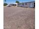 Exterior shot showing landscaping and ample parking at 6733 W Sherri Jean Ln, Peoria, AZ 85382