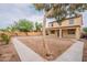 Expansive backyard with ample space, potential for customization, and back patio at 694 W Desert Seasons Dr, San Tan Valley, AZ 85143