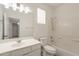 Cozy bathroom featuring a single vanity sink, and a shower-tub combo with bright white walls at 694 W Desert Seasons Dr, San Tan Valley, AZ 85143