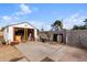 Spacious backyard with a shed, offering ample storage and potential for customization and landscaping projects at 7502 W Cora Ln, Phoenix, AZ 85033