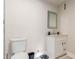 Bathroom featuring a modern vanity with lots of space and a toilet at 7502 W Cora Ln, Phoenix, AZ 85033