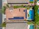 A bird's eye view of the house featuring solar panels and a private backyard pool at 7939 W Fetlock Trl, Peoria, AZ 85383
