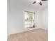 Bright bedroom featuring neutral carpet, a ceiling fan, and a window for natural light at 8807 W Cinnabar Ave, Peoria, AZ 85345