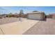 Charming single-story home featuring an attached two car garage with long driveway at 8807 W Cinnabar Ave, Peoria, AZ 85345