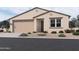 Charming single-story home with a two-car garage and a low maintenance desert landscape at 9524 W Parkway Dr, Tolleson, AZ 85353