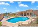 Large backyard pool with patio seating and beautifully landscaped areas at 9545 E Gary St, Mesa, AZ 85207