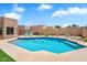 Sparkling backyard pool with a tiled edge and desert landscaping at 9545 E Gary St, Mesa, AZ 85207