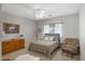 Calm bedroom with a comfortable bed, soft colors, and decorative accents at 11360 E Keats Ave # 20, Mesa, AZ 85209
