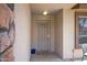A close up shot of the front door with security door and welcome mat at 11360 E Keats Ave # 20, Mesa, AZ 85209
