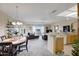 Open-concept living room with cozy seating area and kitchen at 11360 E Keats Ave # 20, Mesa, AZ 85209