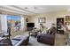 Bright living room with large window, beamed ceilings, and comfortable seating at 11360 E Keats Ave # 20, Mesa, AZ 85209