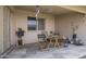 Comfortable covered patio with table and chairs, offering a cozy outdoor seating area at 11360 E Keats Ave # 20, Mesa, AZ 85209