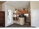 A kitchen with stainless appliances and counter seating is attached to a living space at 11375 E Sahuaro Dr # 2064, Scottsdale, AZ 85259