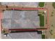 Aerial view of home with defined property lines, showing the roof, patio, and manicured backyard at 13162 W Golden Puma Trl, Peoria, AZ 85383