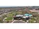 Expansive community amenities featuring a pool, playground, basketball court, and common areas at 13162 W Golden Puma Trl, Peoria, AZ 85383