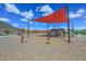 Community playground with play equipment at 13162 W Golden Puma Trl, Peoria, AZ 85383