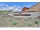 Elegant community signage displaying 'Northpointe', surrounded by desert landscaping and stone architecture at 13162 W Golden Puma Trl, Peoria, AZ 85383