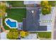 Aerial view showcasing the property's layout, pool, expansive backyard, and neighborhood at 1535 W Berridge Ln, Phoenix, AZ 85015