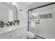 Updated bathroom with a glass-enclosed shower, modern vanity, and sleek fixtures at 1561 N Sterling St, Mesa, AZ 85207
