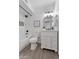 Bathroom featuring a shower-tub combo with mosaic accents and modern vanity at 1561 N Sterling St, Mesa, AZ 85207