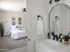 A clean bathroom with a modern vanity and view to the main bedroom at 1561 N Sterling St, Mesa, AZ 85207