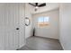 Bright bedroom featuring a large window and neutral decor, creating a serene space at 1561 N Sterling St, Mesa, AZ 85207