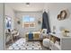 Charming bedroom with a cozy bed, playful decorations, and a bright window at 1561 N Sterling St, Mesa, AZ 85207