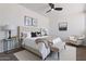 Elegant main bedroom with a king-size bed, decorative lamps, and neutral color palette at 1561 N Sterling St, Mesa, AZ 85207