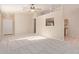 Spacious living room featuring neutral paint and plush carpeting at 16209 W Acapulco Cir, Surprise, AZ 85379