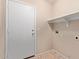 Mud room with a shelf and tile floors at 16209 W Acapulco Cir, Surprise, AZ 85379